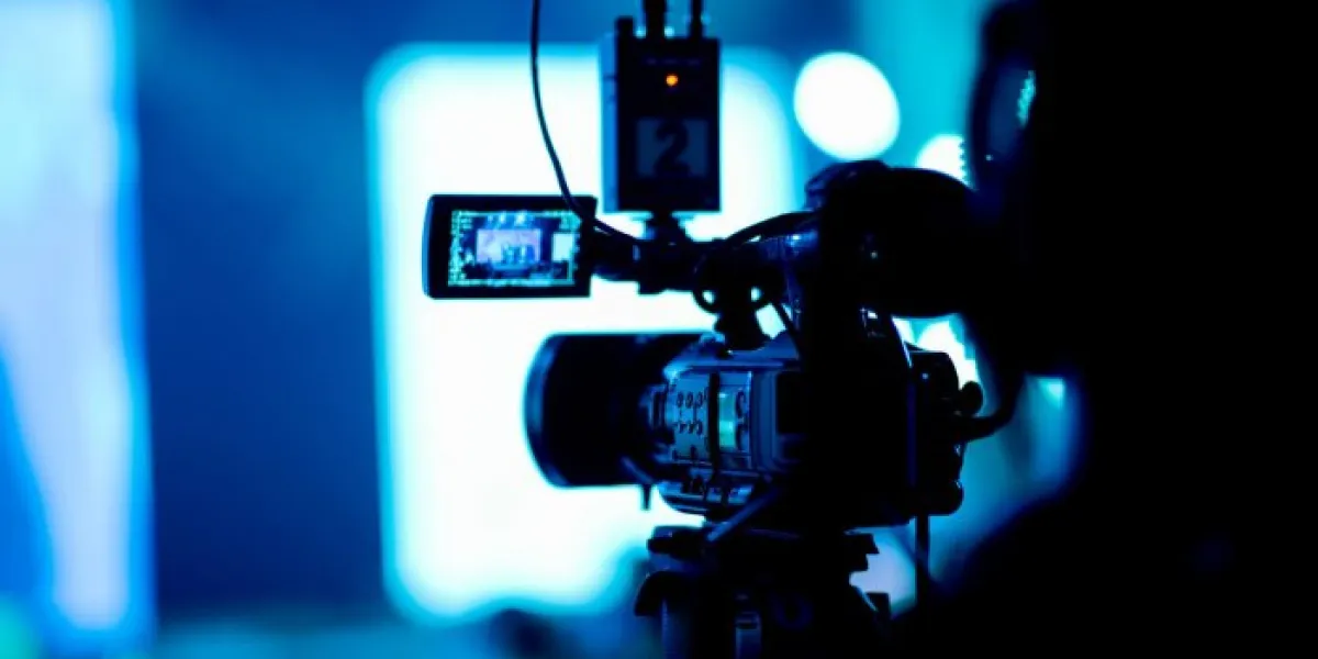 videographer close up, cameraman, man with camera, movie,n