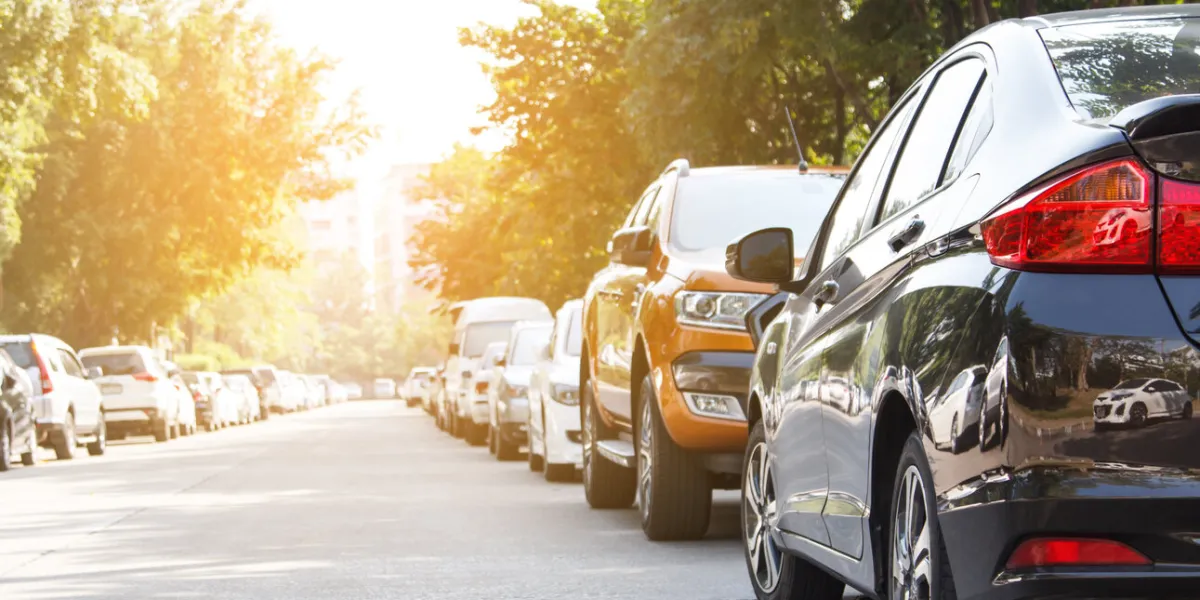 black car parking in line outdoor