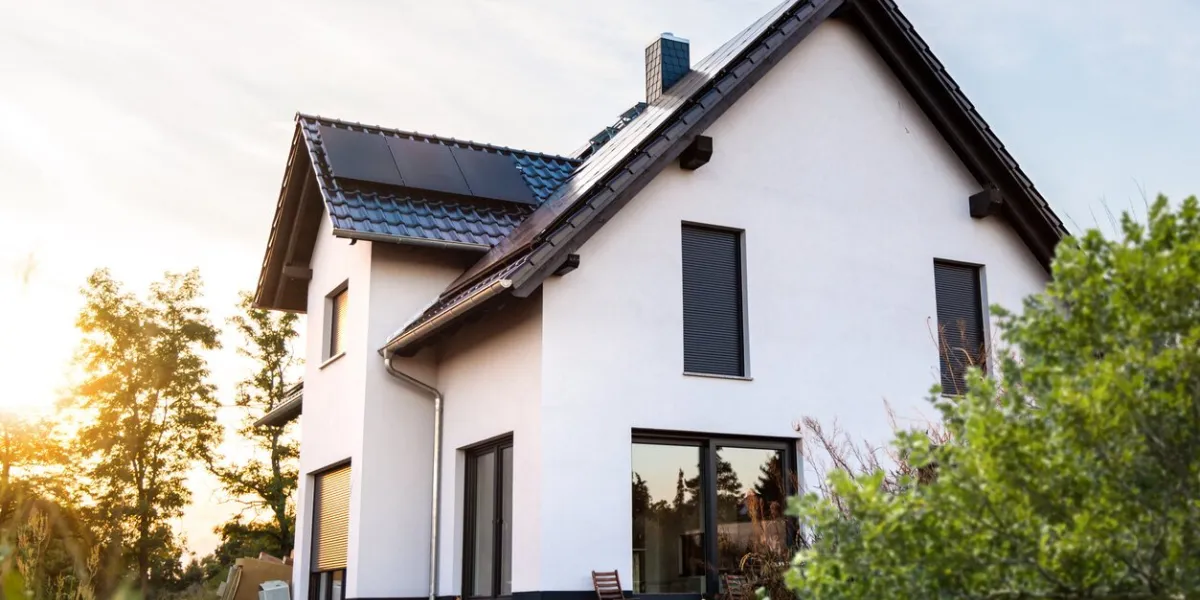 exterior of a newly built single-family home in germany the house has solar panels on the roof and is built to modern standards in terms of sustainability