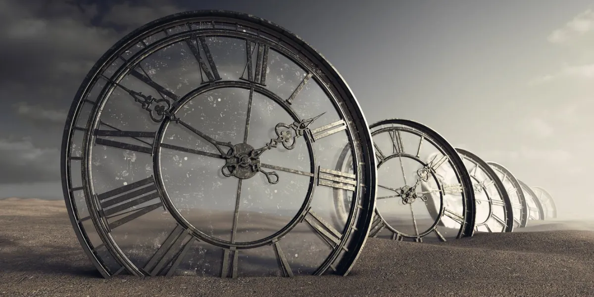 a line of half buried antique clocks with a glass backing in a sandy desert landscape - 3d render