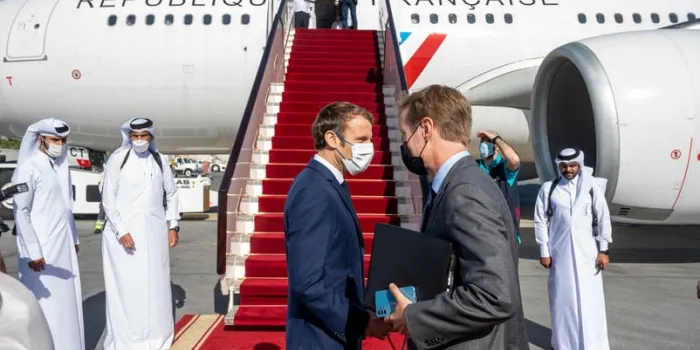 president macron leaves qatar - doha