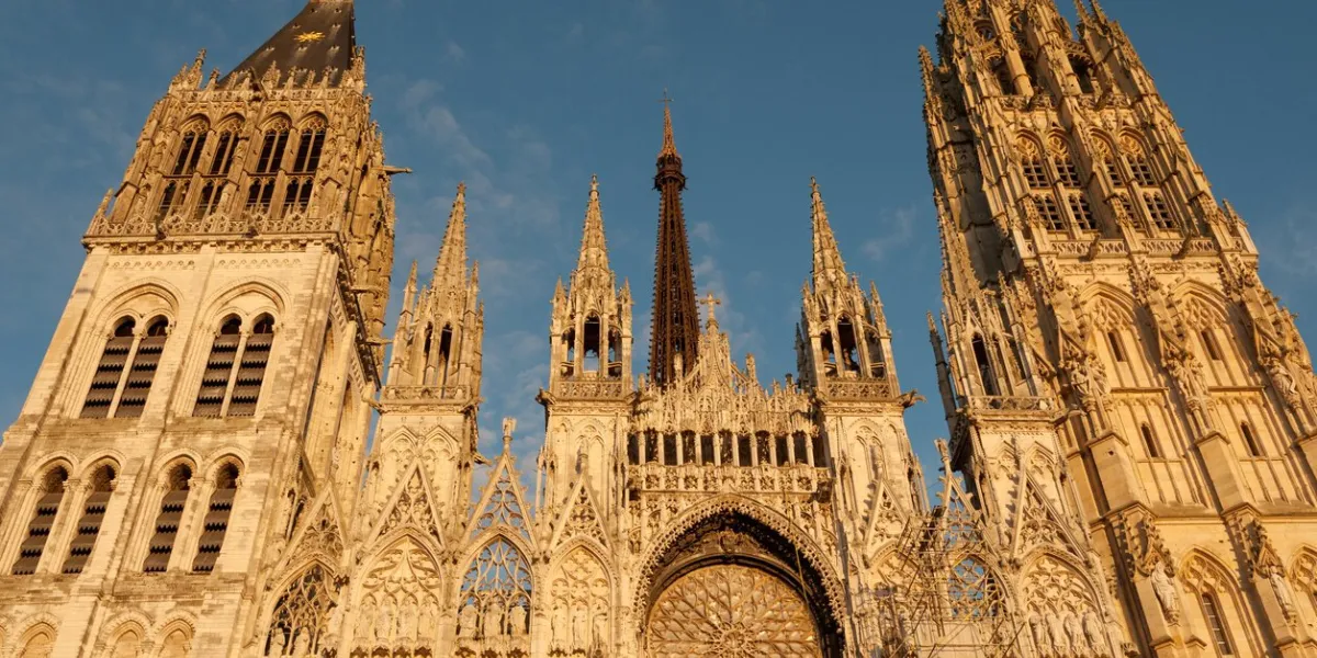famous notre-dame de rouen cathedral at twilight