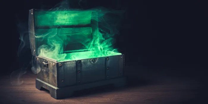 pandoras box with smoke on a wooden background