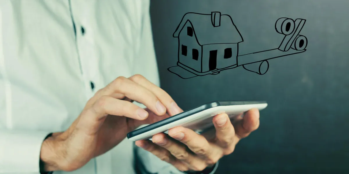 human by holding a house and percent sign