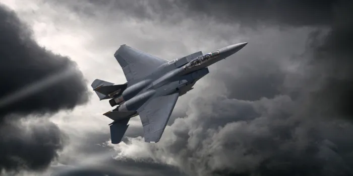 f-15 eagle flying through the storm
