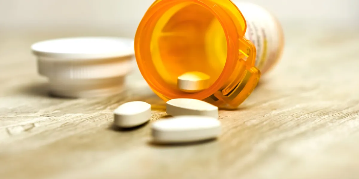 amoxicillin clavulanic acid 500 mg tablets with orange prescription bottle