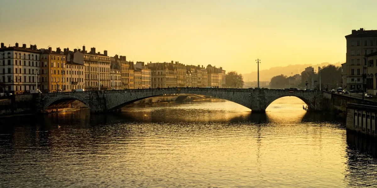dusk on the bonaparte bridge which crosses the saone towards the saint georges district