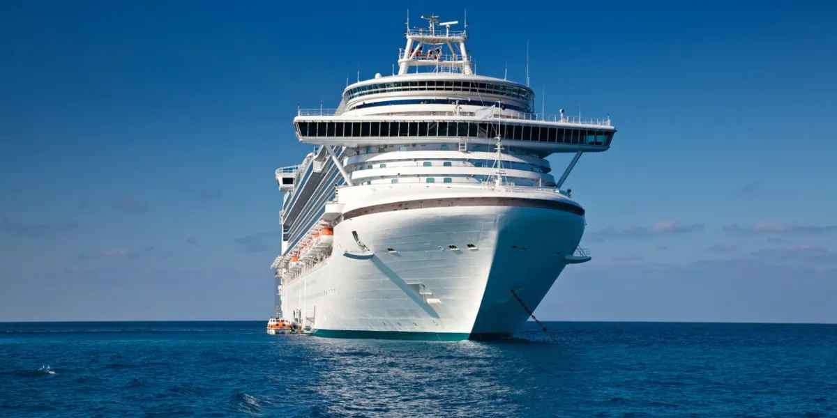 eastern caribbean sea - february 8, 2010  a luxury cruise ship anchored in the sea to allow passengers to be tendered to tropical island for the day as part of a 7 day eastern caribbean cruise