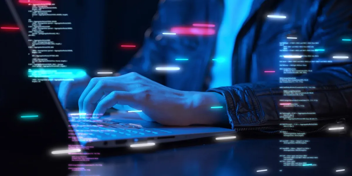 business man using computer hand close up futuristic cyber space and decentralized finance coding background, business data analytics programming online network metaverse digital world technology