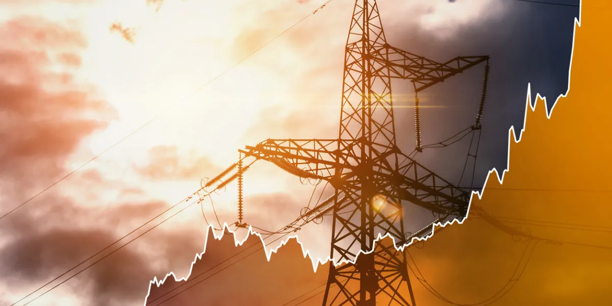 transmission tower and raising sparkline chart representing electricity prices rise during global energy crisis