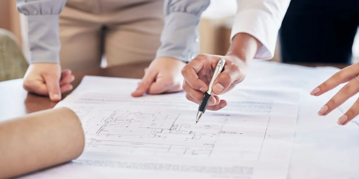 team work, hands or architect drawing a blueprint or planning a real estate building or development in an office civil engineering, zoom or designers with vision of renovation or project management