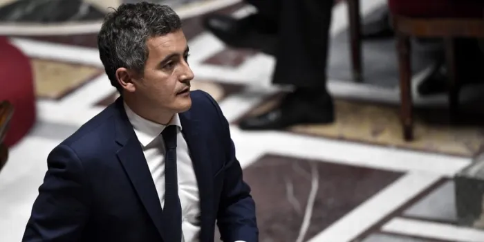 french interior minister gerald darmanin stands up to speak during a session of questions to the government, on july 28, 2020 at the national assembly in paris (photo by stephane de sakutin   afp)