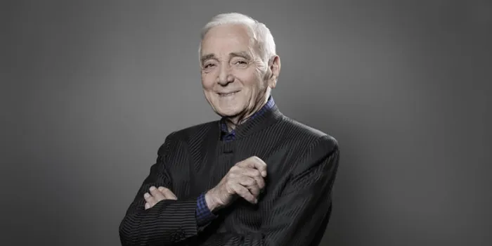 french-armenian singer charles aznavour poses during a photo session in paris on november 16, 2017   afp photo   joel saget