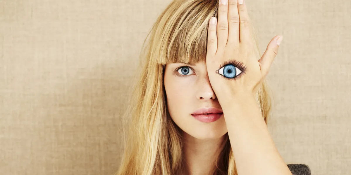 beautiful blond woman with painted eye