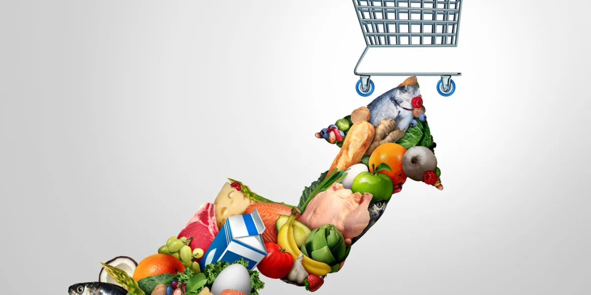 grocery inflation and rising food prices or surging cost of supermarket groceries as an inflationary financial crisis concept and the rise of costs coming with a shopping cart shaped as an arrow with 3d render elements