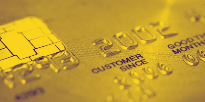closeup of gold credit card