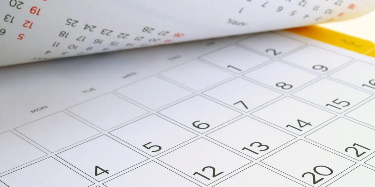 desk calendar with days and dates in july 2016, flip the calendar page
