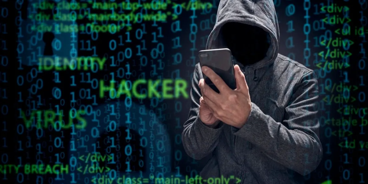 computer hacker with mobile phone smartphone stealing data