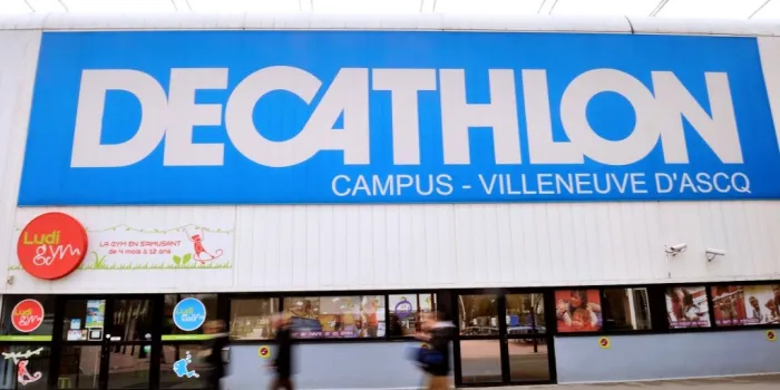 people walk in front of a decathlon store on february 25, 2014 in the french northern city of villeneuve d'ascq    afp photo philippe huguen (photo by philippe huguen   afp)