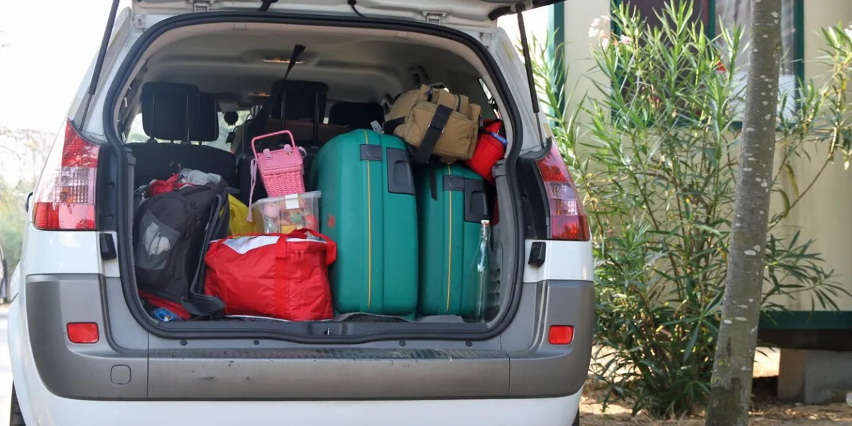 car full of suitcases and bags before leaving for summer vacation