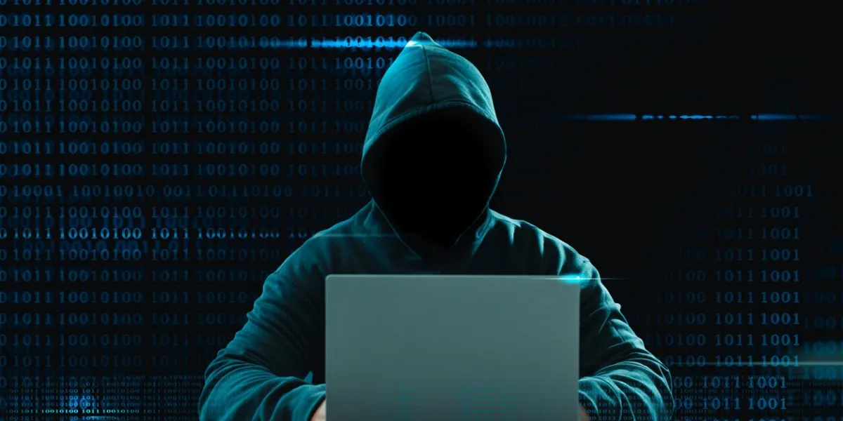 big financial data theft concept an anonymous hacker is hacking highly-protected financial data through computers