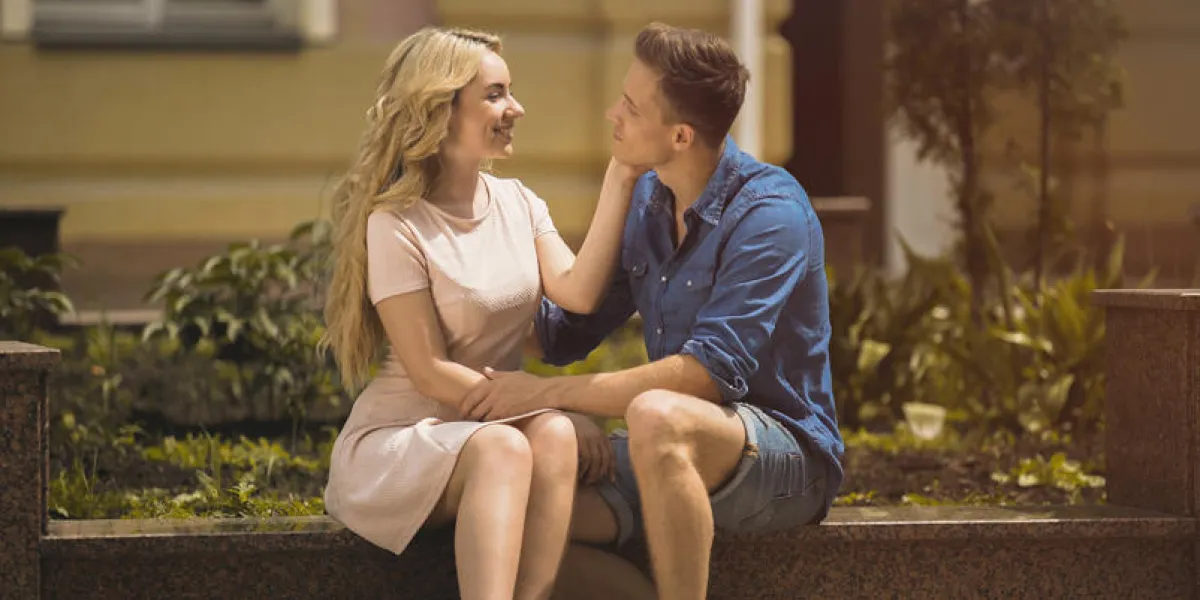 sweet young lady touching beloved mans face tenderly, love story, relationship