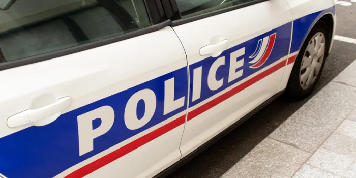 biarritz, france - december 23, 2020  close-up shot of the word police written on the side of a patrol vehicle of the french national police, france