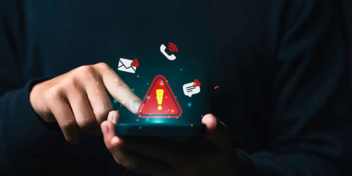 fraud alert or smartphone scam, system hacked warning alert on mobile cyber attack network, virus, spyware, malware, malicious software cyber security and cybercrime warning notification