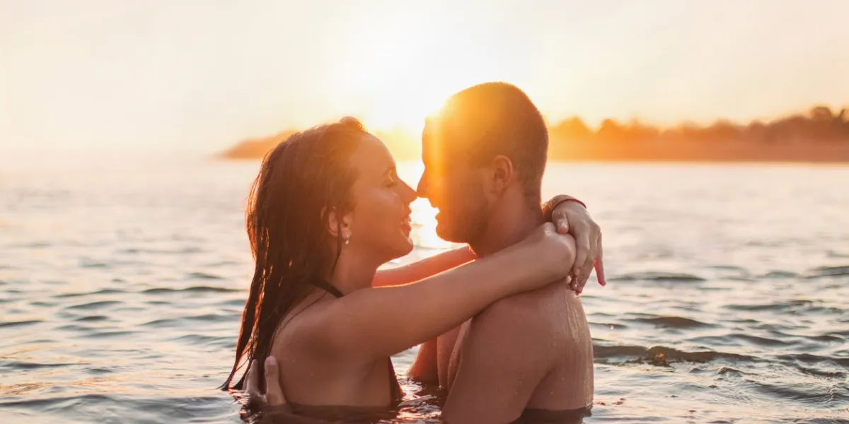young couple having fun at the beach