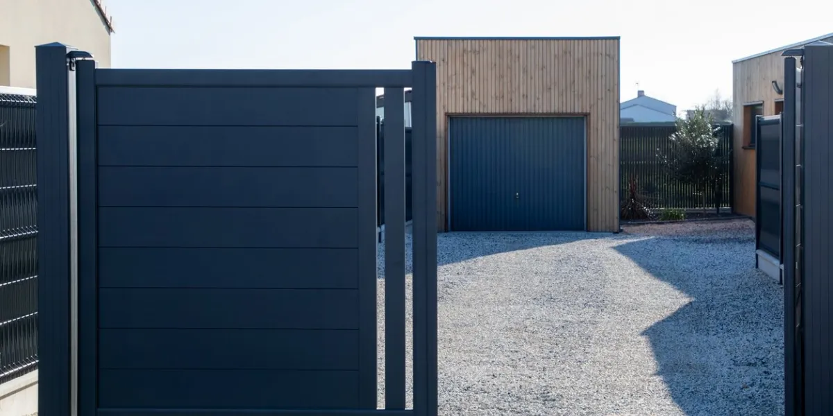 open grey double portal large metal gate high gray on suburb street house garage door