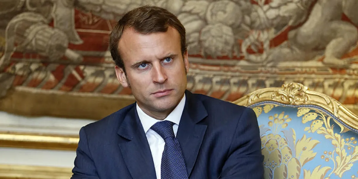 french economy minister emmanuel macron attends a meeting on energy housing renovation following the presentation of the 34 plans for the new industrial france on september 9, 2014 at the elysee palace in paris afp photo   pool   patrick kovarik