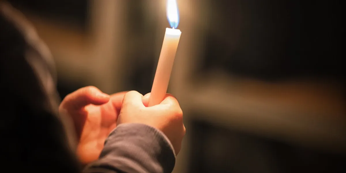 kids are handling candles in the traditionall dresses celebration of lucia day in sweden