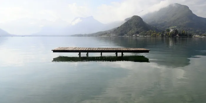 landscape of annecy lake and mountains in savoy, france
