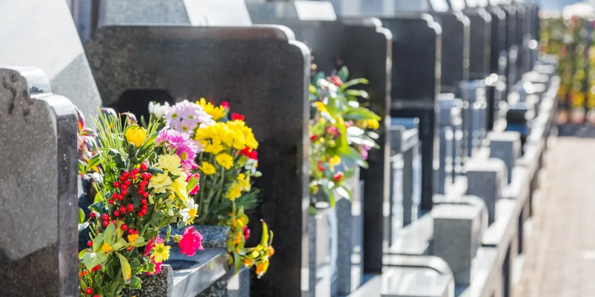 cemetery tombstones and flowers