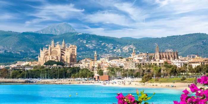 landscape with beach and palma de mallorca town, spain
