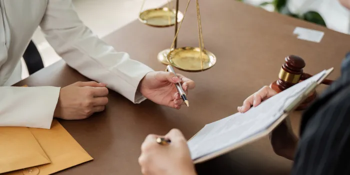 lawyer, legal advisor, businessperson explaining agreement details business contracts