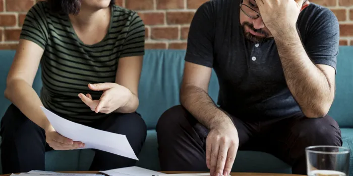couple managing the debt