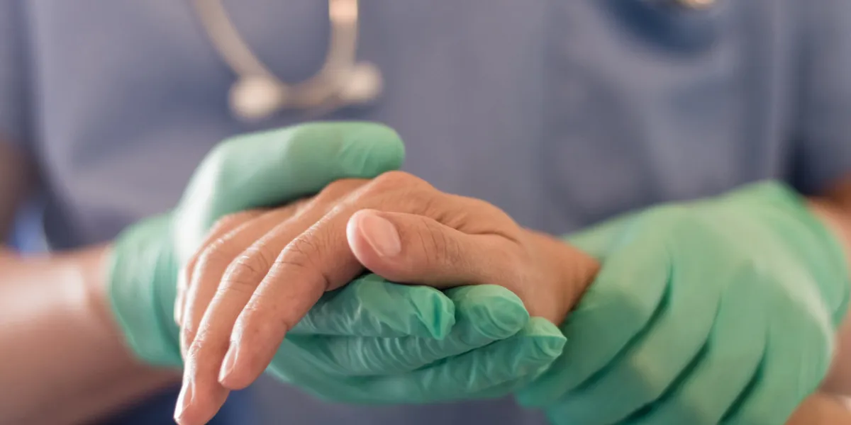 surgeon, physician performs surgical operations, anesthetist or anesthesiologist holding patient's hand ffor checking state of mand or support in er room, medical healthcare concept