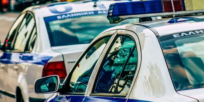 closeup of an official police car patrolling the streets of the city center of the metropolitan area