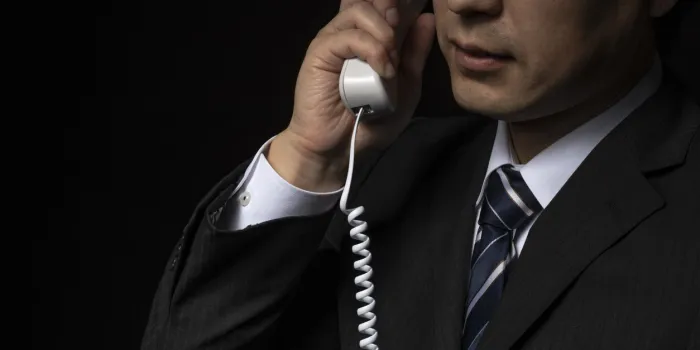 men talking on the phone