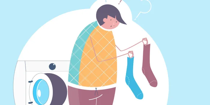 the mystery of socks disappearing in washing machine flat vector illustration with a man with two socks of different color