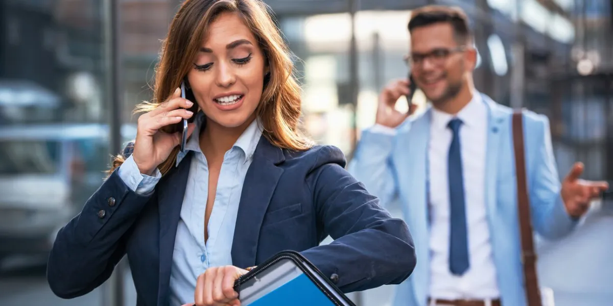 she never late businesswoman looking at her watch on the way to office business, lifestyle concept