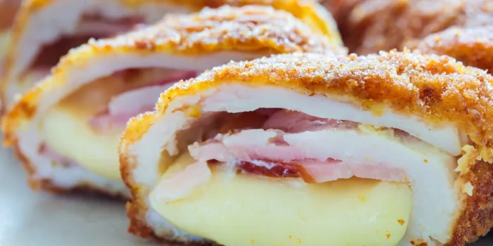 cordon bleu speciality (rolls with chicken breast, ham and cheddar cheese)