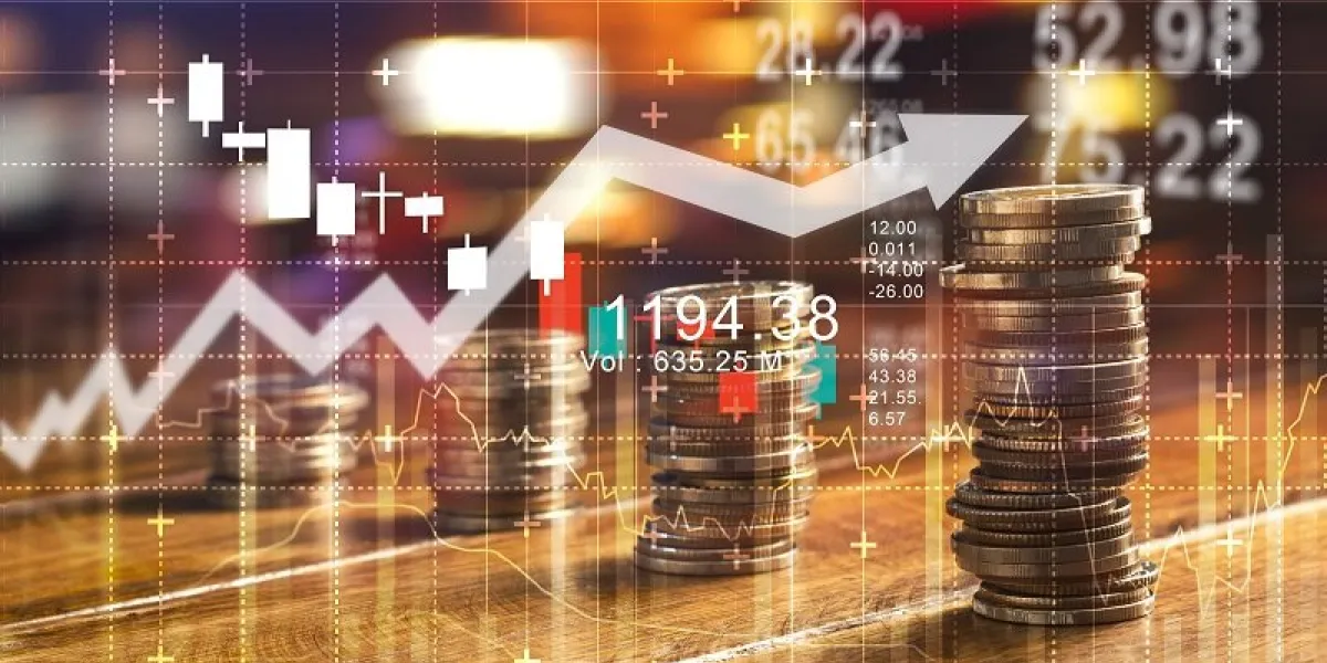 finance and business concept investment graph and rows growth and of coins on table