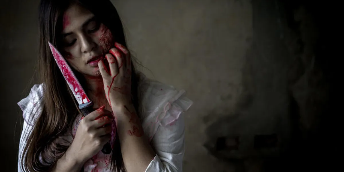 ghost woman or zombie holding knife for kill with blood violence in house of ruin, nightmare, horror of scary fear on hell is monster devil in halloween festival, copy space the right