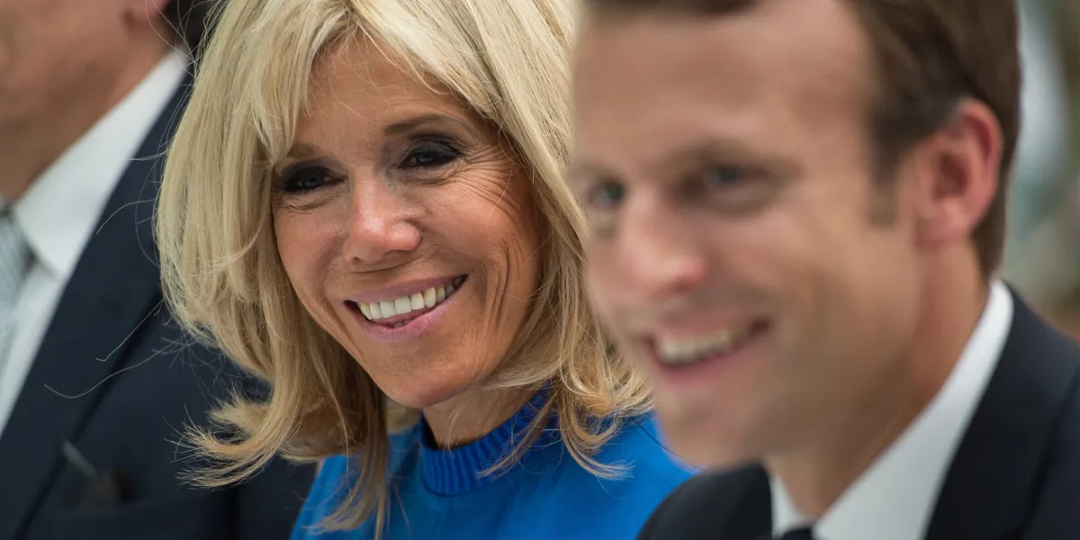 emmanuel macron and brigitte macron with local members of the french community in athens