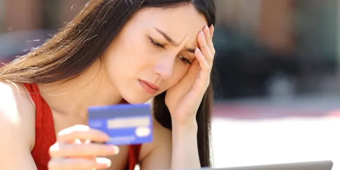 worried woman having problems buying online