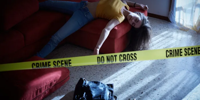 crime scene imitation lifeless woman lying on the sofa