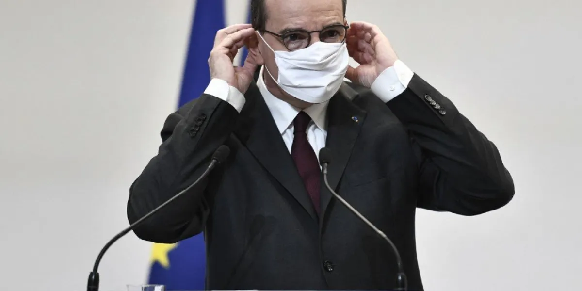 french prime minister jean castex touches his protective face mask during a press conference on the government's current strategy for the ongoing covid-19 pandemic in paris, on february 25, 2021 (photo by stephane de sakutin   pool   afp)