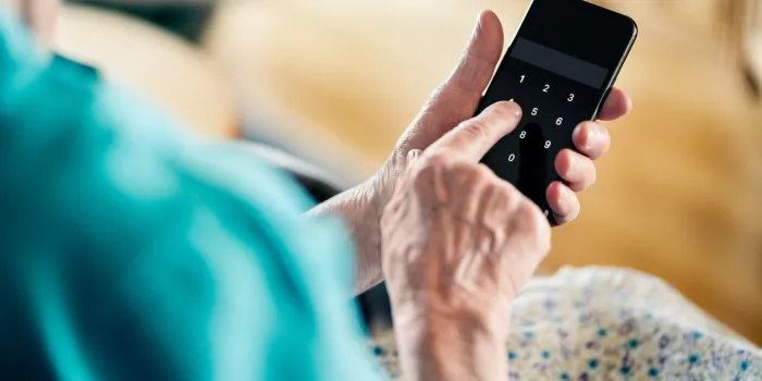 old senior woman and phone password number code against online scam cyber security elder mature person protect bank data with pin lock fraud and hoax safety privacy from hacker and scammer online